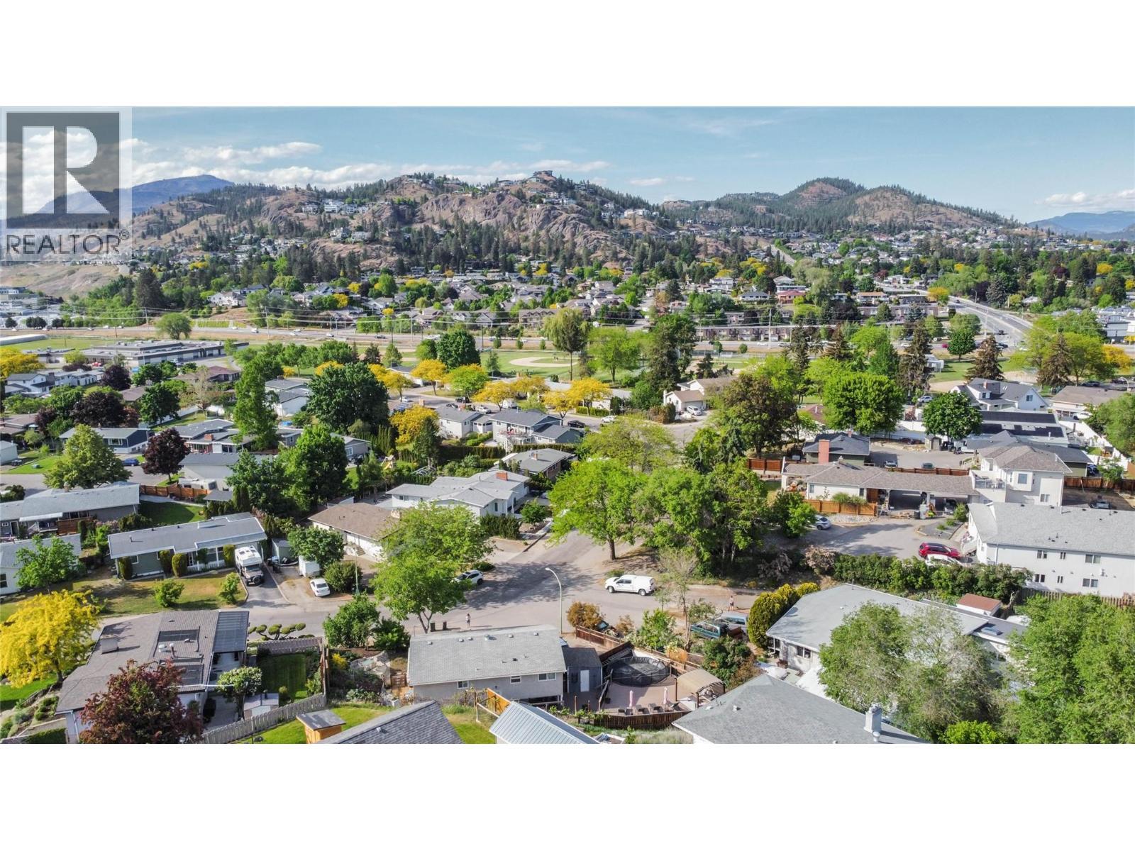 Minutes to schools and the rail trail - 1385 Orchard Drive, Kelowna, BC - Outdoor With View
