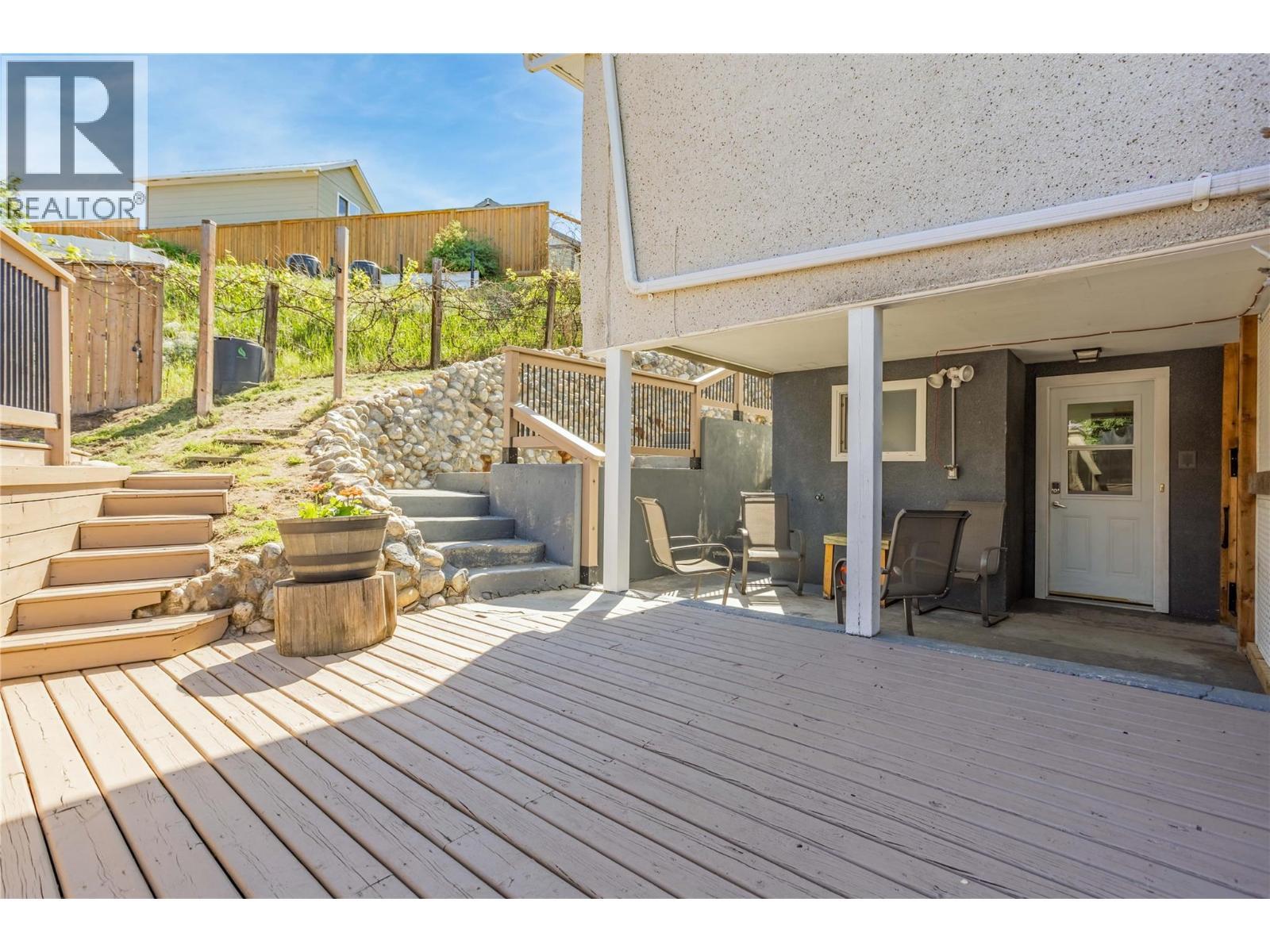 Super private patio space - 1385 Orchard Drive, Kelowna, BC - Indoor Photo Showing Gym Room
