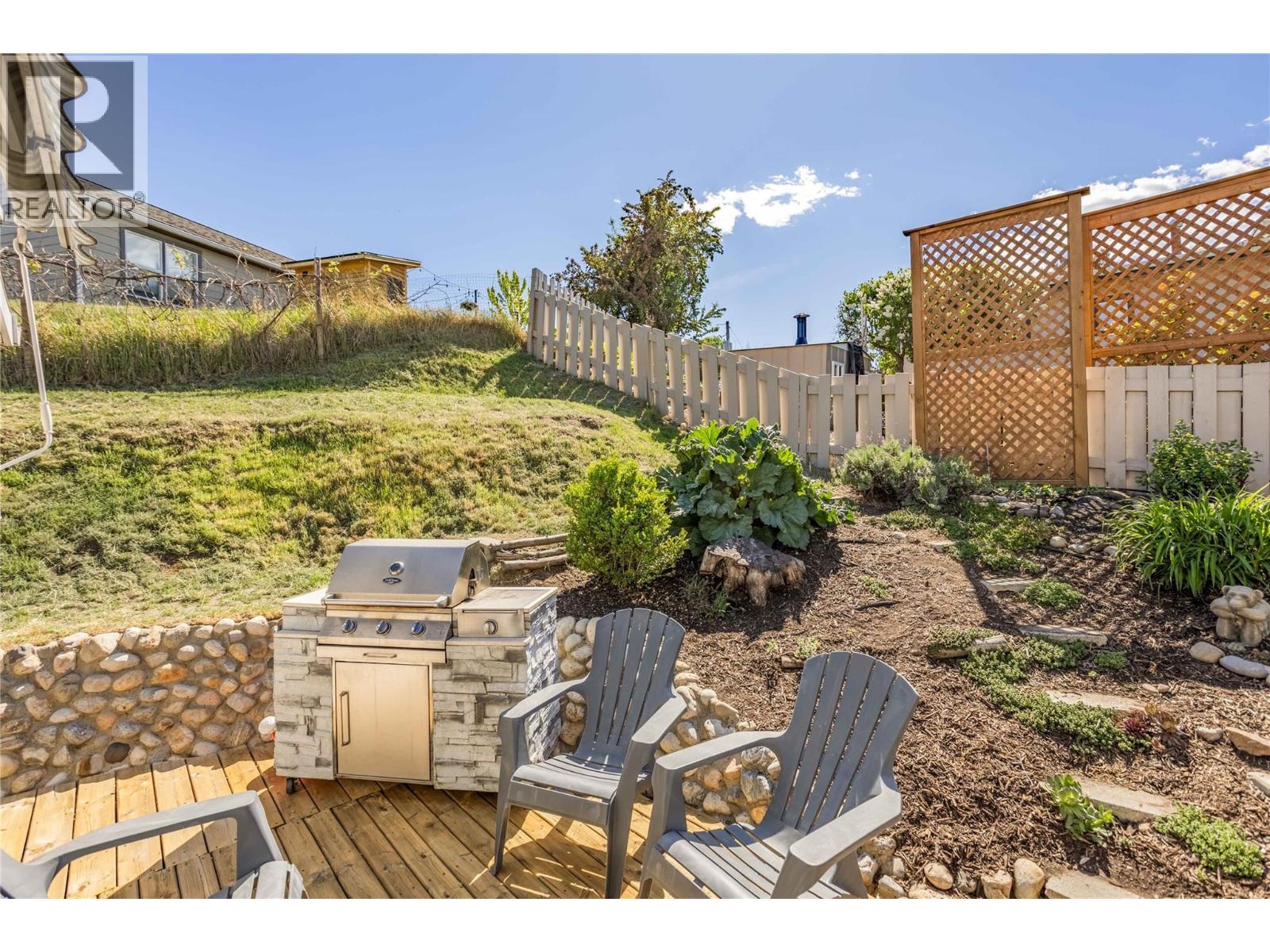 BBQ patio right off the kitchen - 1385 Orchard Drive, Kelowna, BC - Outdoor