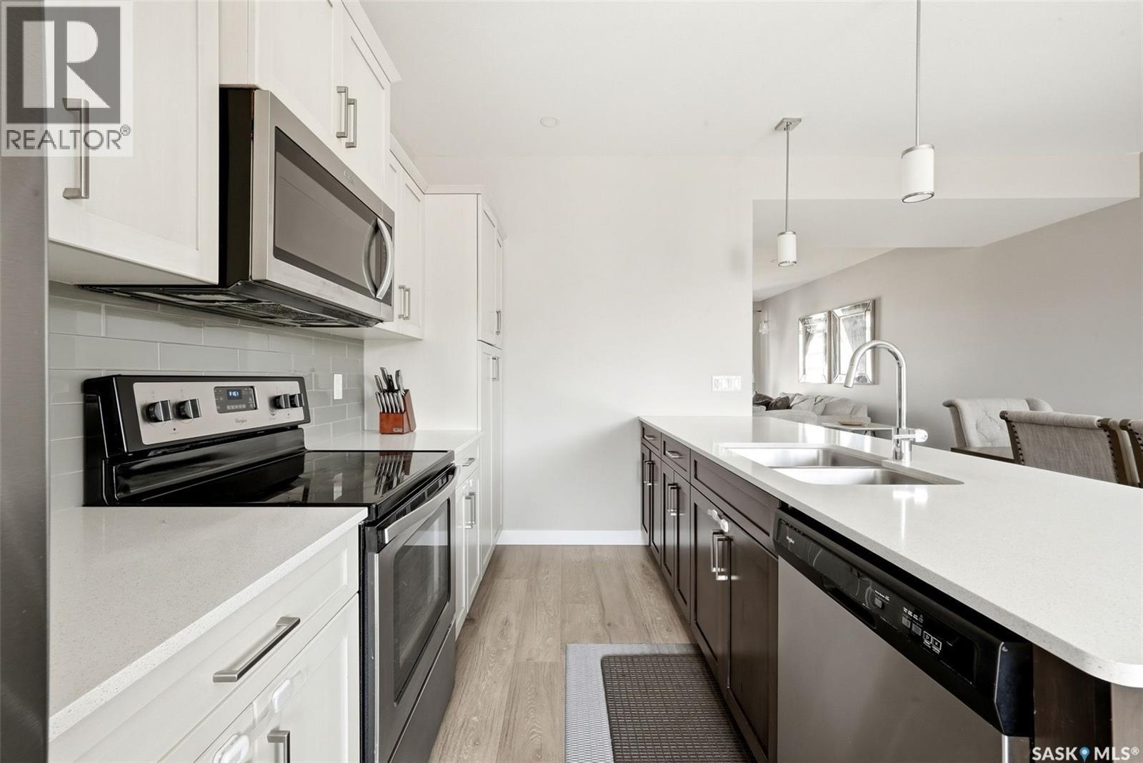 4217 E Keller Avenue, Regina, SK - Indoor Photo Showing Kitchen With Stainless Steel Kitchen With Double Sink With Upgraded Kitchen