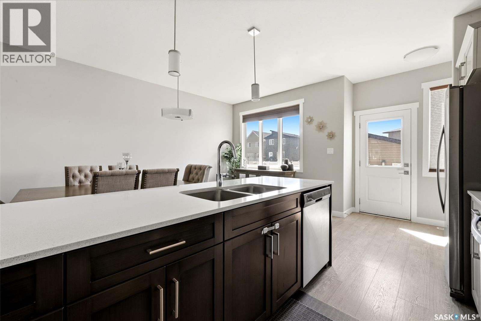 4217 E Keller Avenue, Regina, SK - Indoor Photo Showing Kitchen With Double Sink