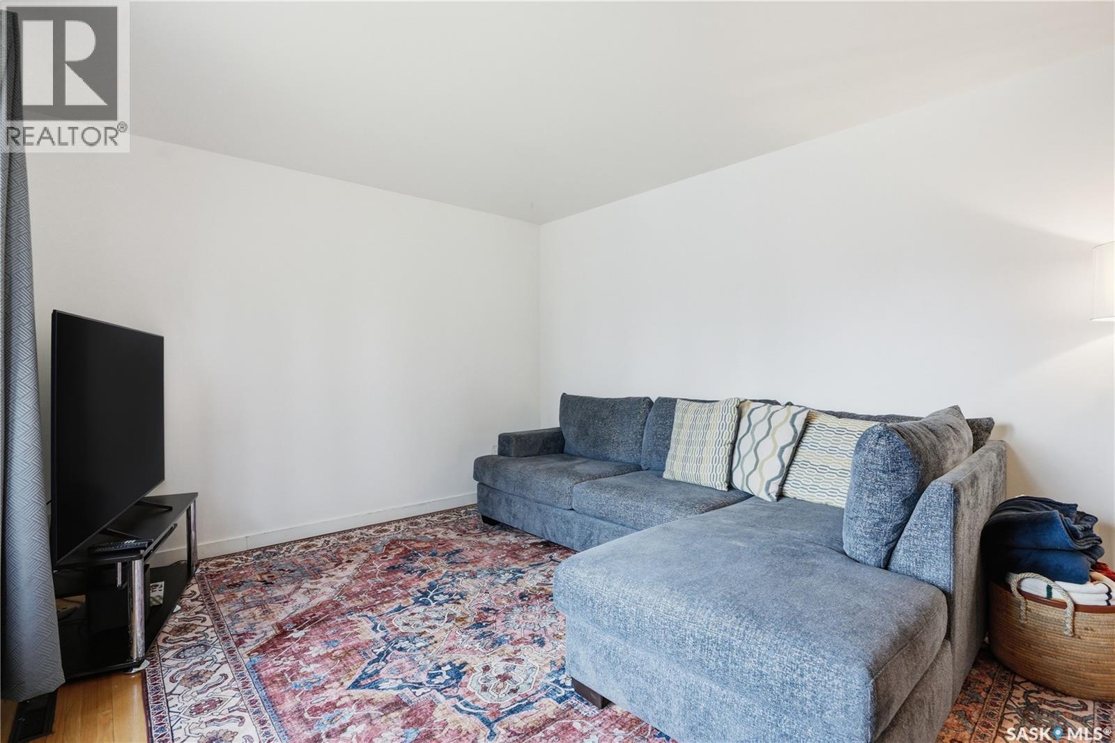 1113 Wilson Crescent, Saskatoon, SK - Indoor Photo Showing Living Room