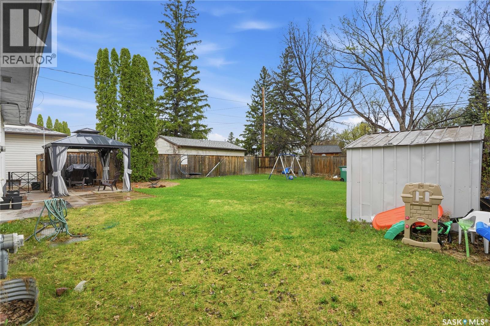 1113 Wilson Crescent, Saskatoon, SK - Outdoor With Backyard