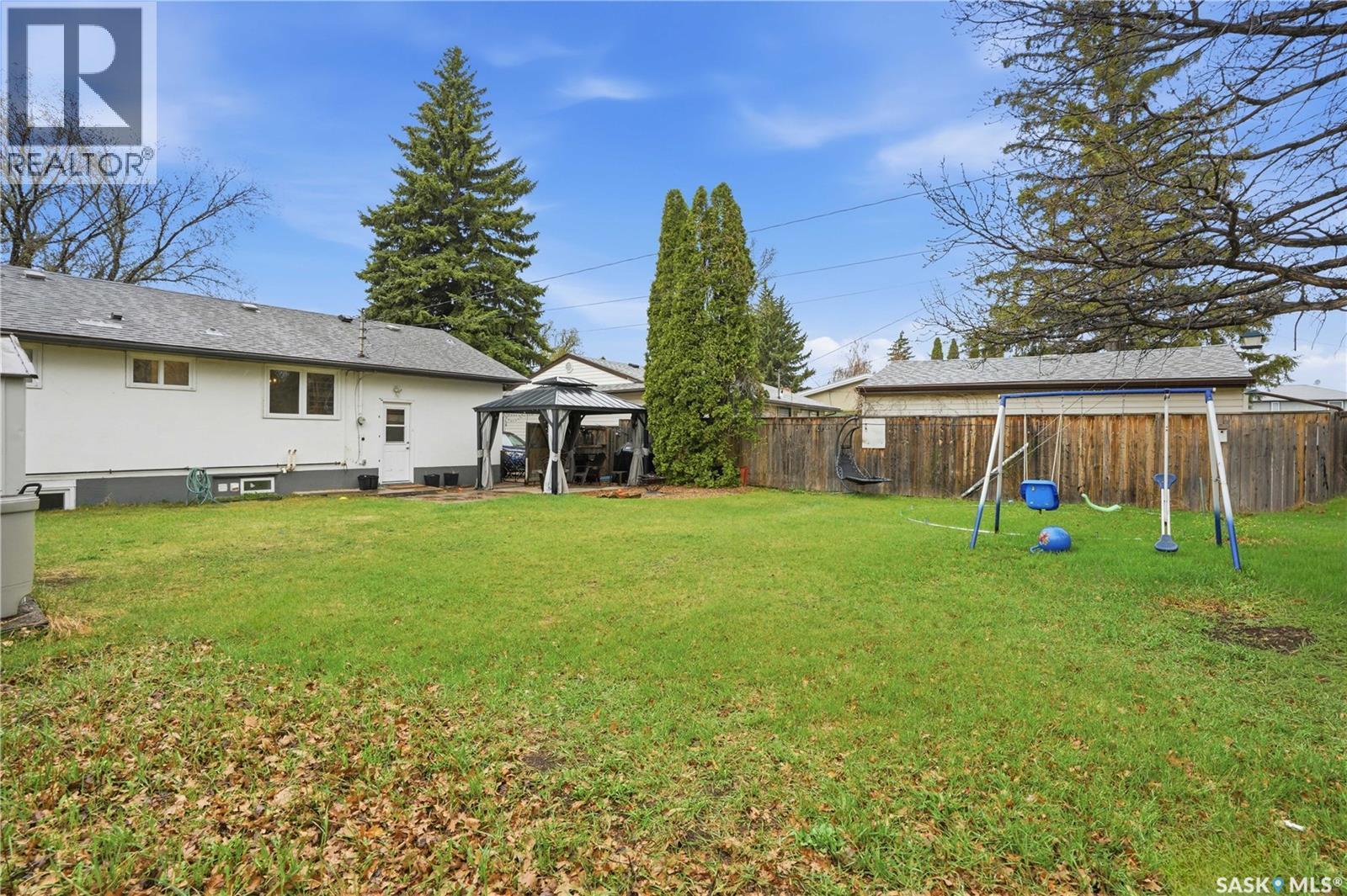 1113 Wilson Crescent, Saskatoon, SK - Outdoor With Backyard