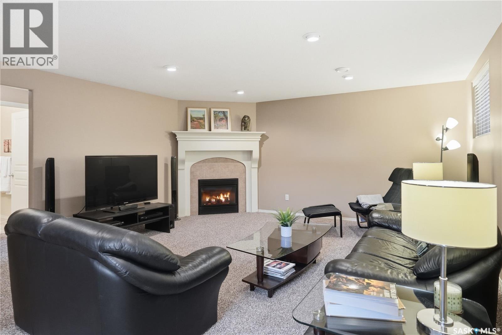 1642 Wingert Drive, Regina, SK - Indoor With Fireplace