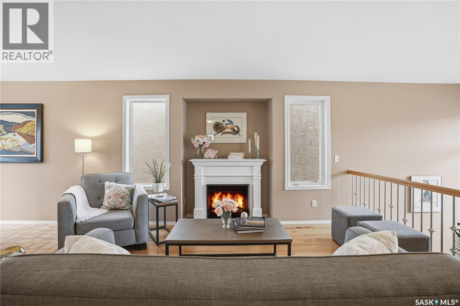 1642 Wingert Drive, Regina, SK - Indoor Photo Showing Living Room With Fireplace