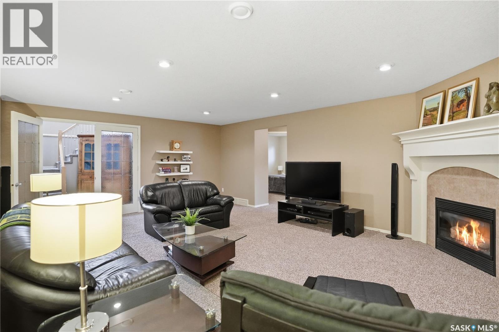 1642 Wingert Drive, Regina, SK - Indoor With Fireplace