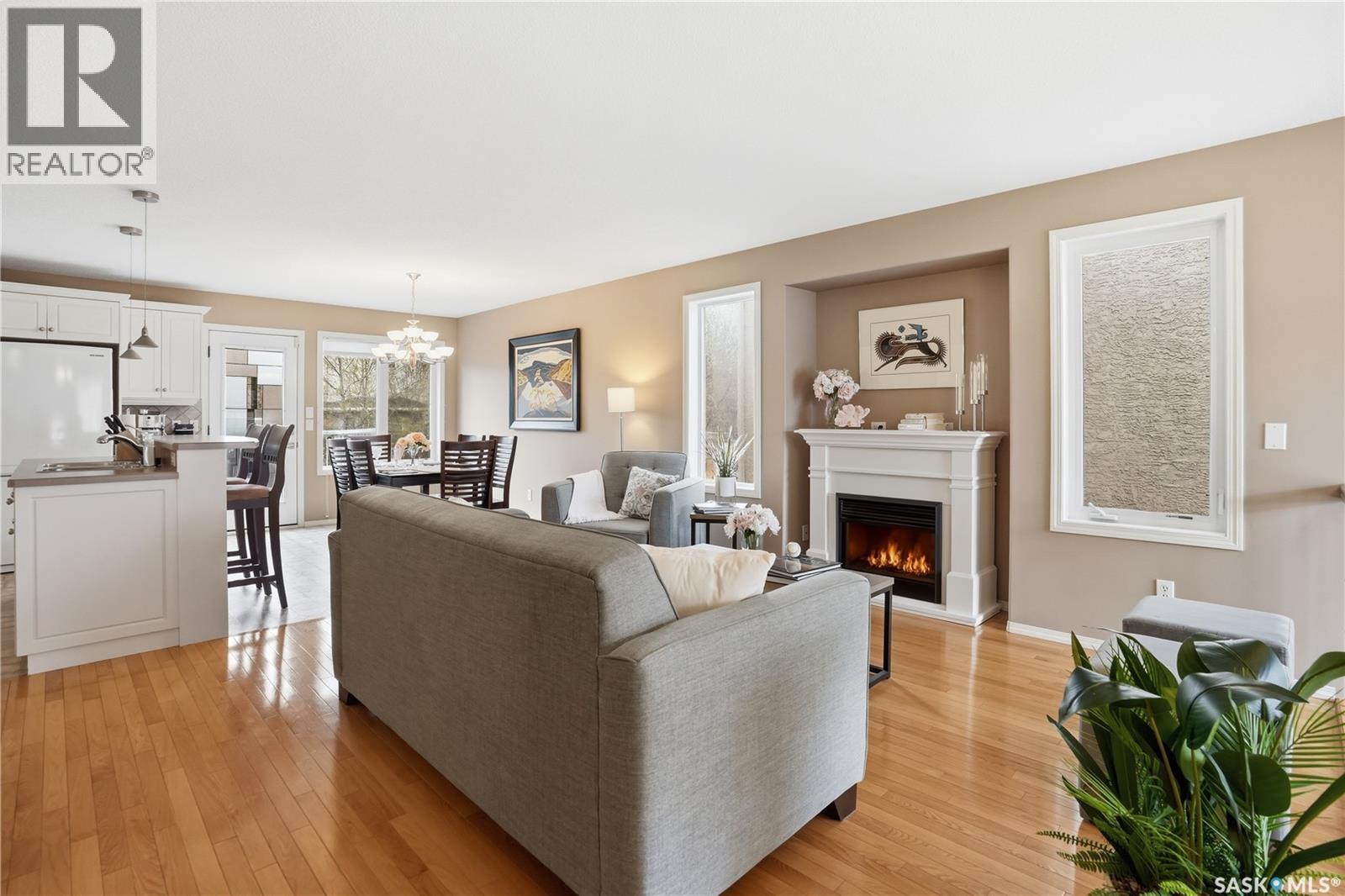 1642 Wingert Drive, Regina, SK - Indoor Photo Showing Living Room With Fireplace