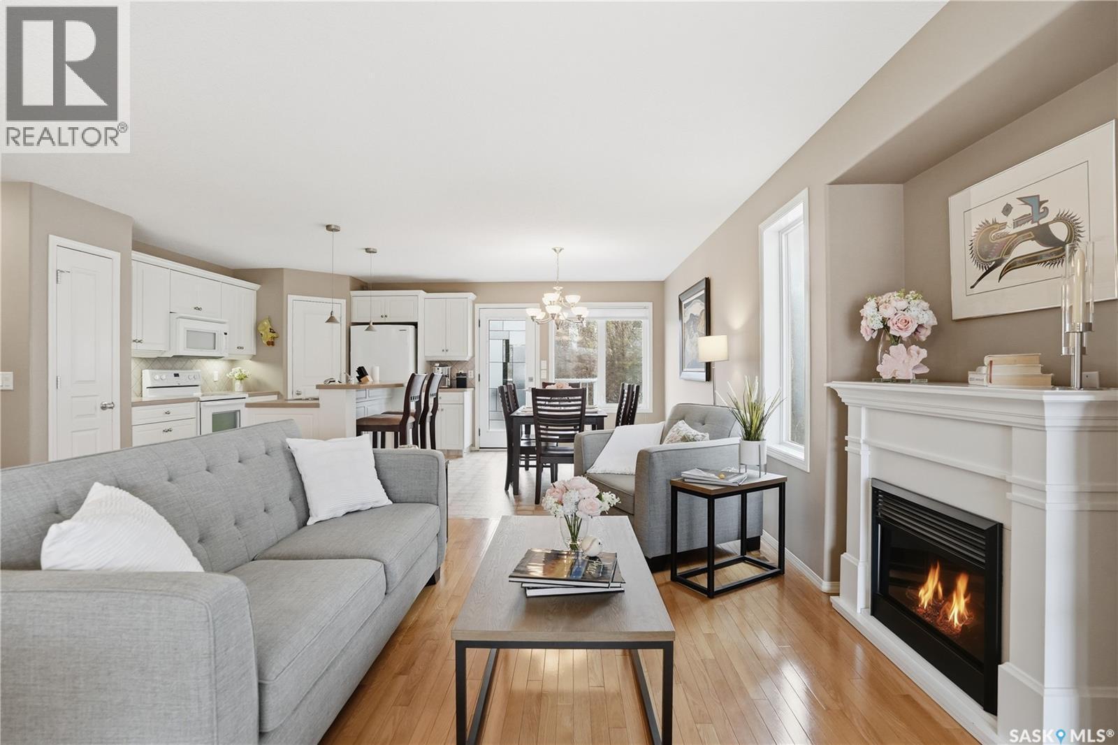 1642 Wingert Drive, Regina, SK - Indoor Photo Showing Living Room With Fireplace