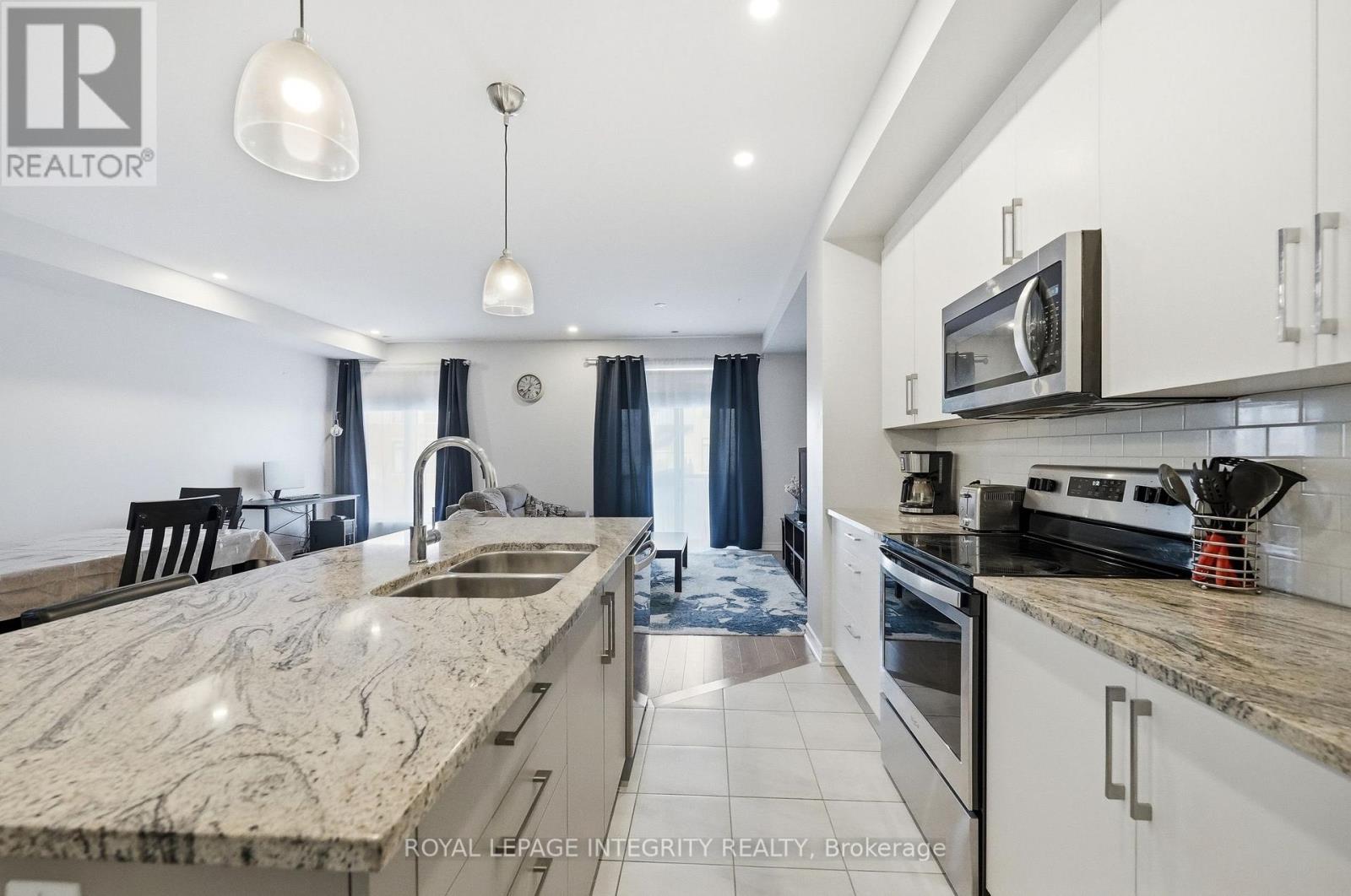 520 Stadacone Row, Ottawa, ON - Indoor Photo Showing Kitchen With Stainless Steel Kitchen With Double Sink With Upgraded Kitchen