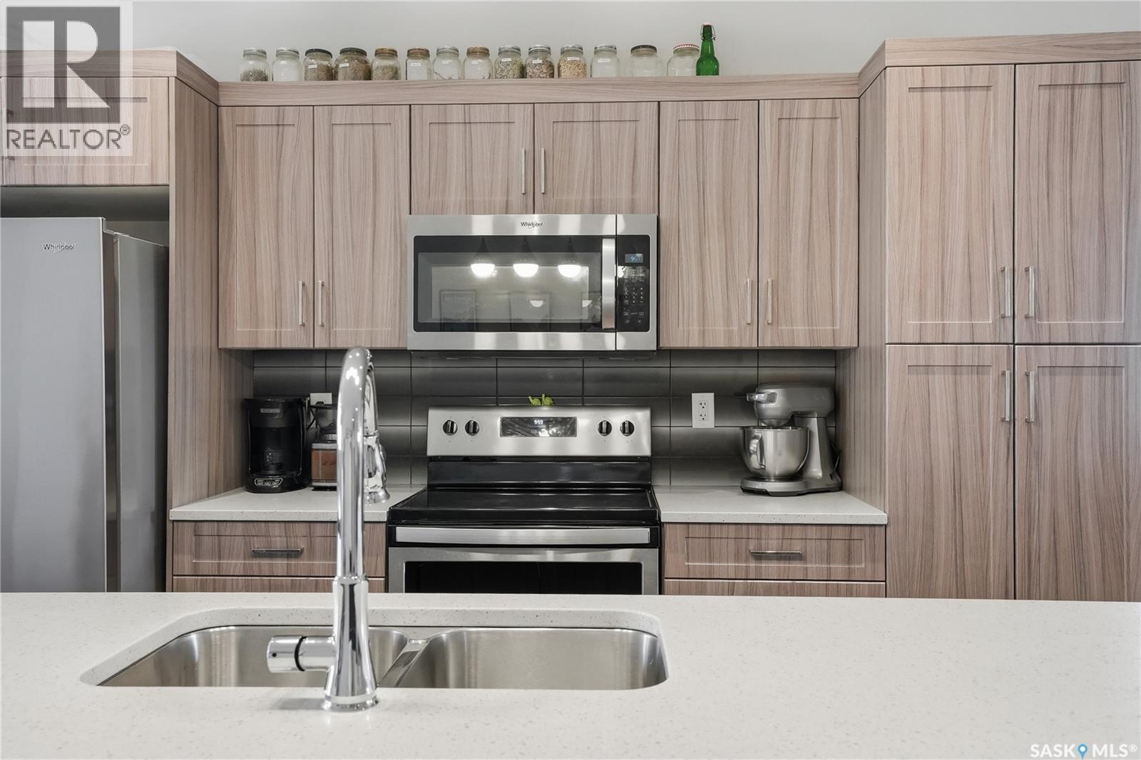 1407 Hughes Drive, Saskatoon, SK - Indoor Photo Showing Kitchen With Double Sink