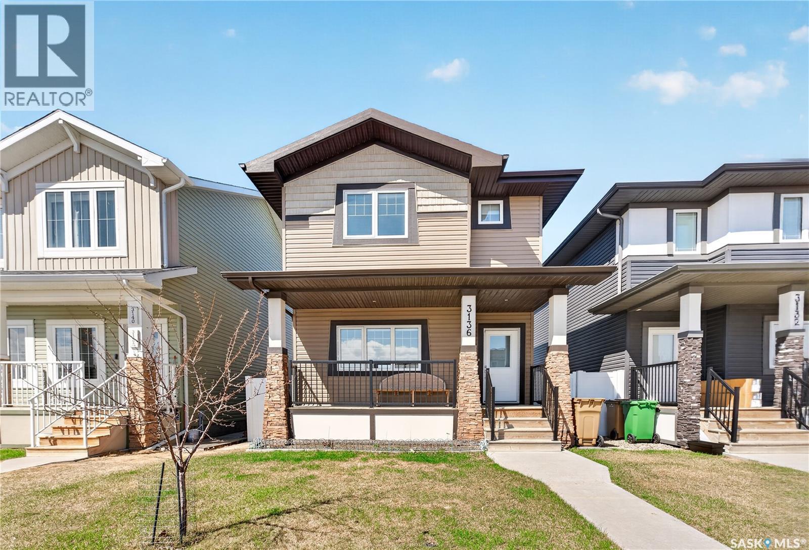 3136 Crosbie Crescent, Regina, SK - Outdoor With Deck Patio Veranda With Facade