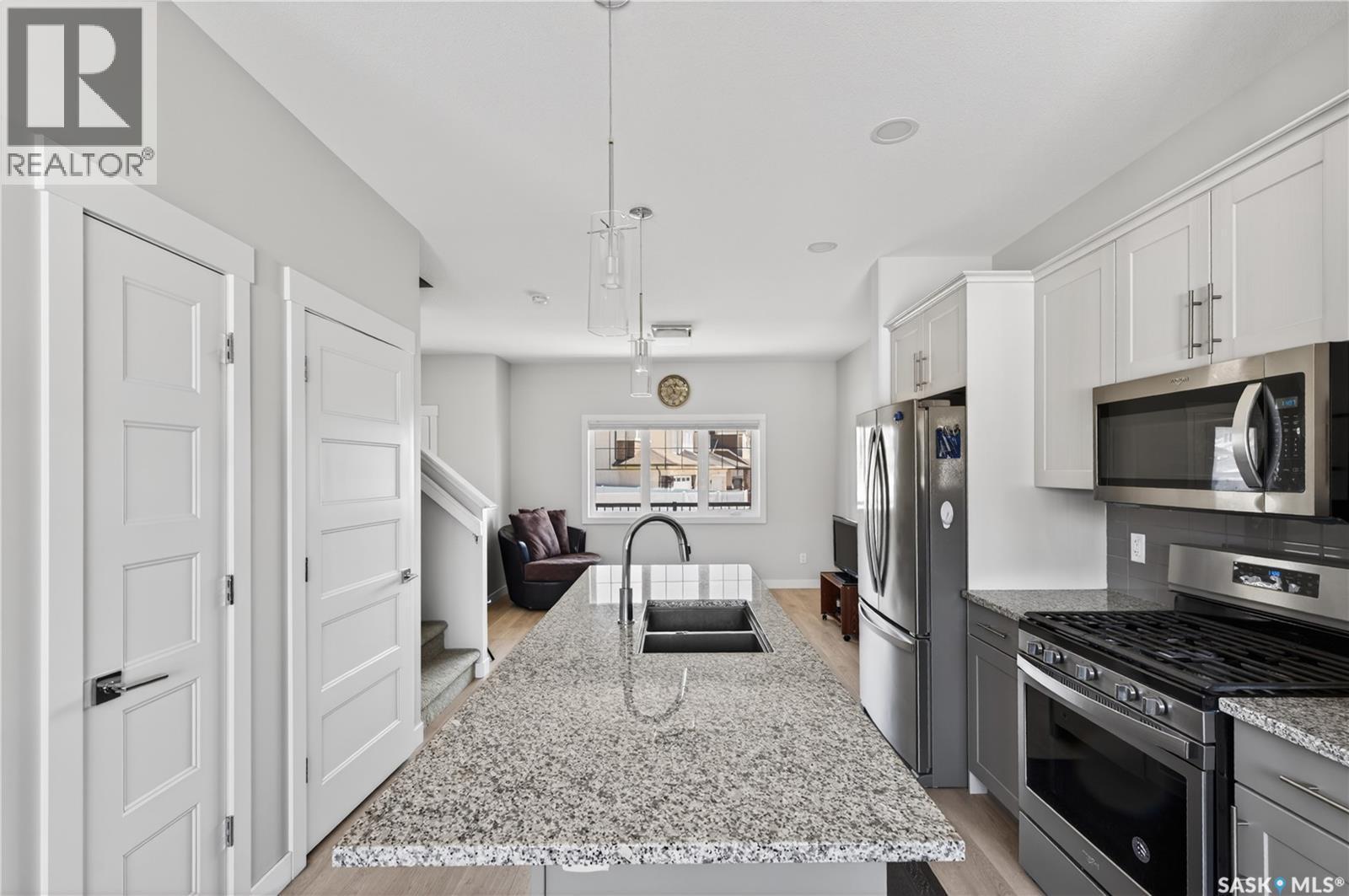 3136 Crosbie Crescent, Regina, SK - Indoor Photo Showing Kitchen With Stainless Steel Kitchen With Double Sink With Upgraded Kitchen