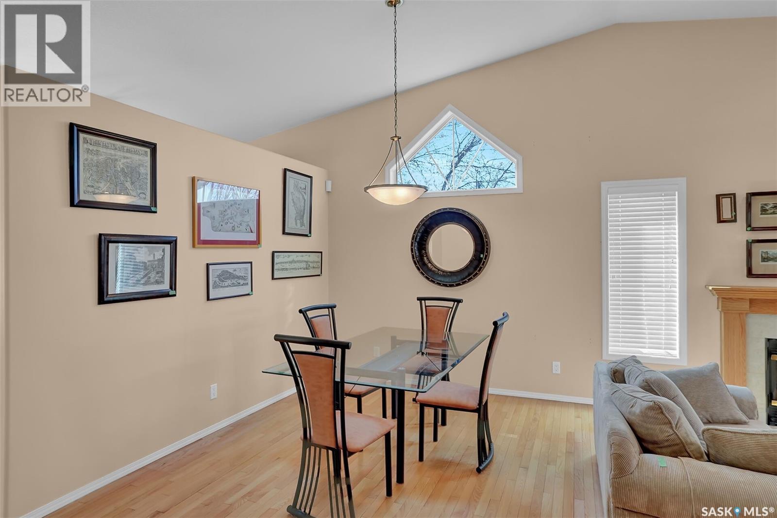 1684 Fenwick Crescent N, Regina, SK - Indoor Photo Showing Dining Room With Fireplace