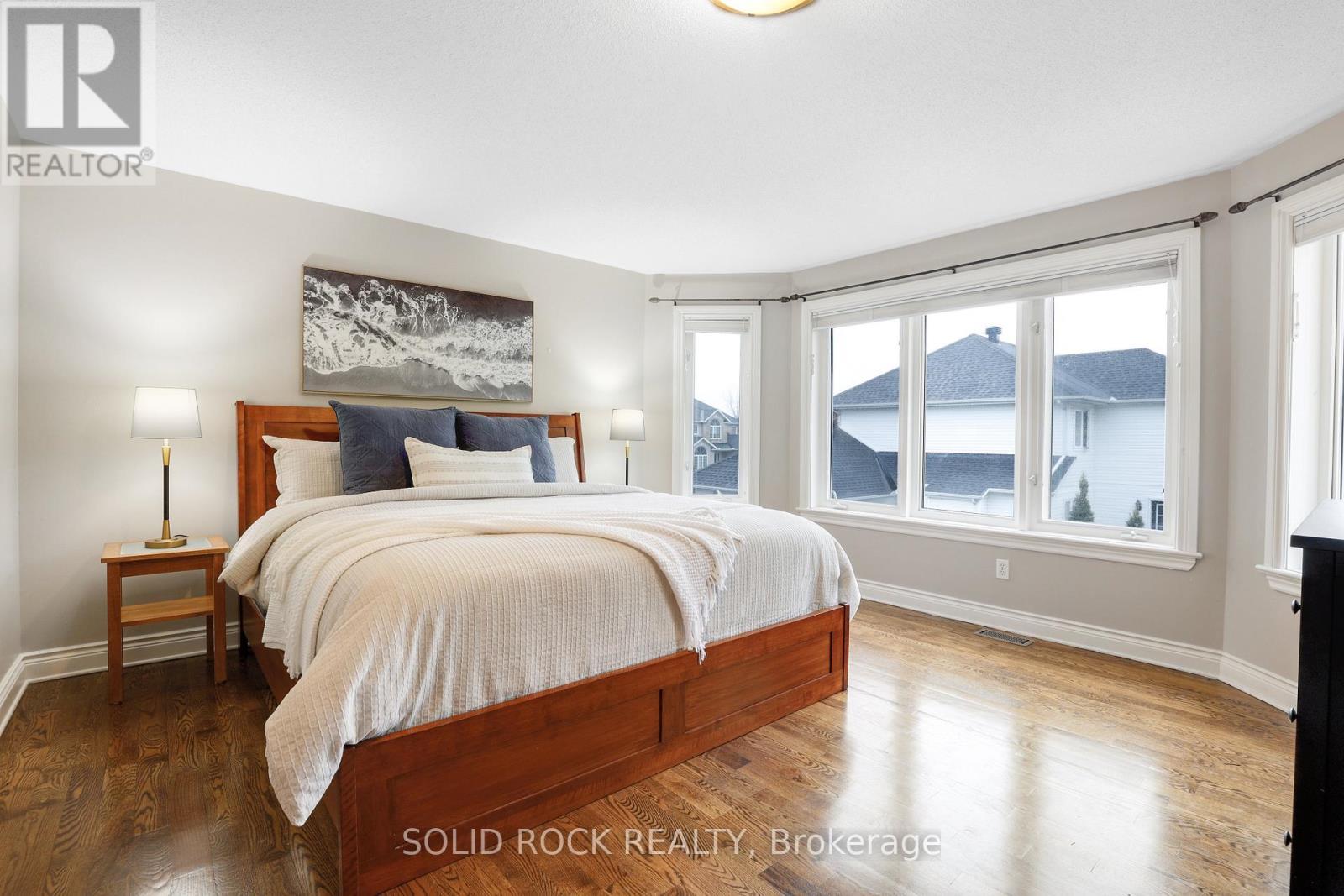 Primary bedroom with bay window - 45 Basswood Avenue, Ottawa, ON - Indoor Photo Showing Bedroom