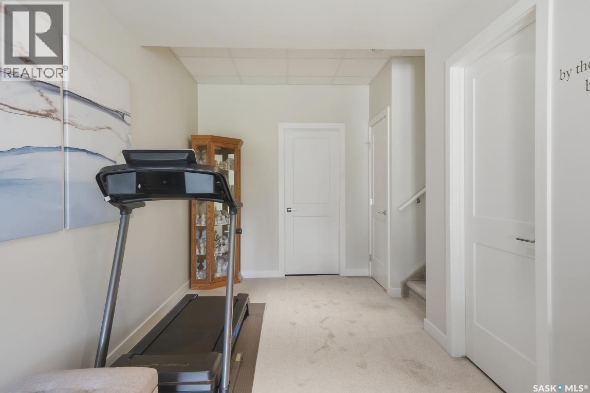27 619 Evergreen Boulevard, Saskatoon, SK - Indoor Photo Showing Gym Room