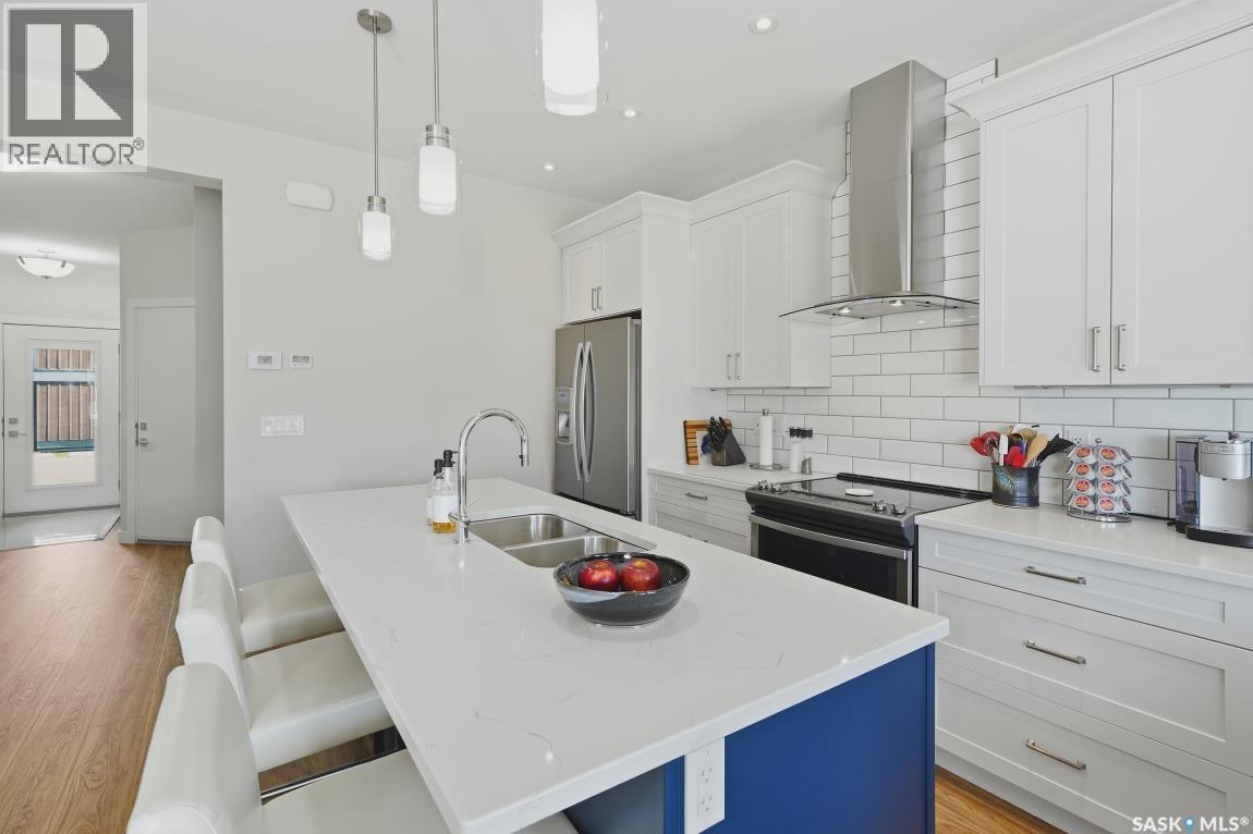 27 619 Evergreen Boulevard, Saskatoon, SK - Indoor Photo Showing Kitchen With Double Sink With Upgraded Kitchen