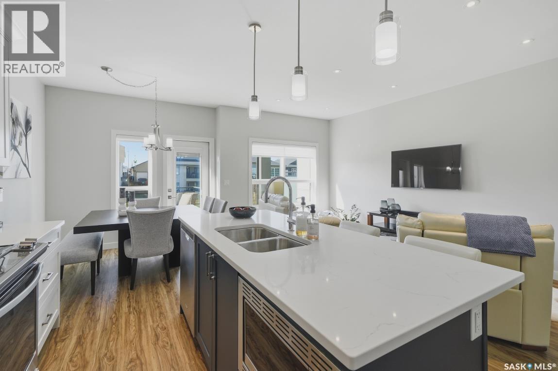27 619 Evergreen Boulevard, Saskatoon, SK - Indoor Photo Showing Kitchen With Double Sink With Upgraded Kitchen