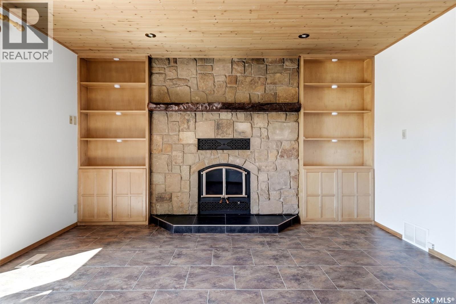 4 Bannister Avenue, Regina, SK - Indoor Photo Showing Other Room With Fireplace