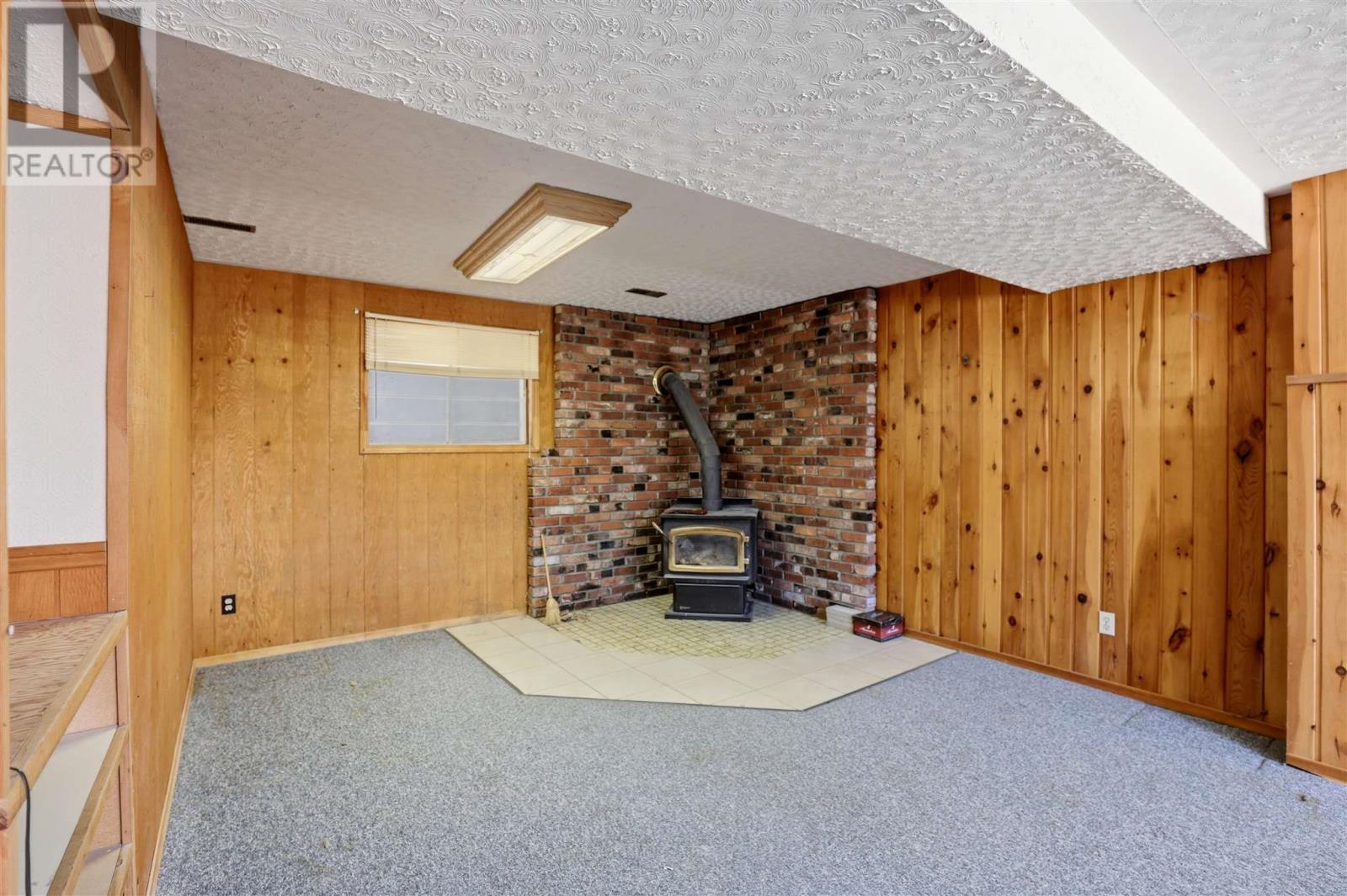 4562 Second Lin W, Prince Township, ON - Indoor Photo Showing Other Room With Fireplace