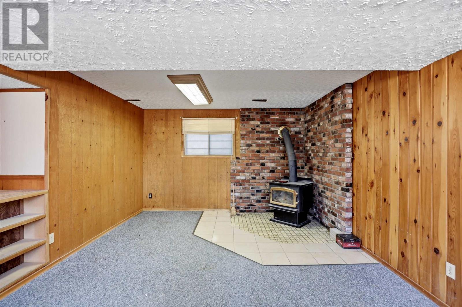 4562 Second Lin W, Prince Township, ON - Indoor Photo Showing Other Room With Fireplace
