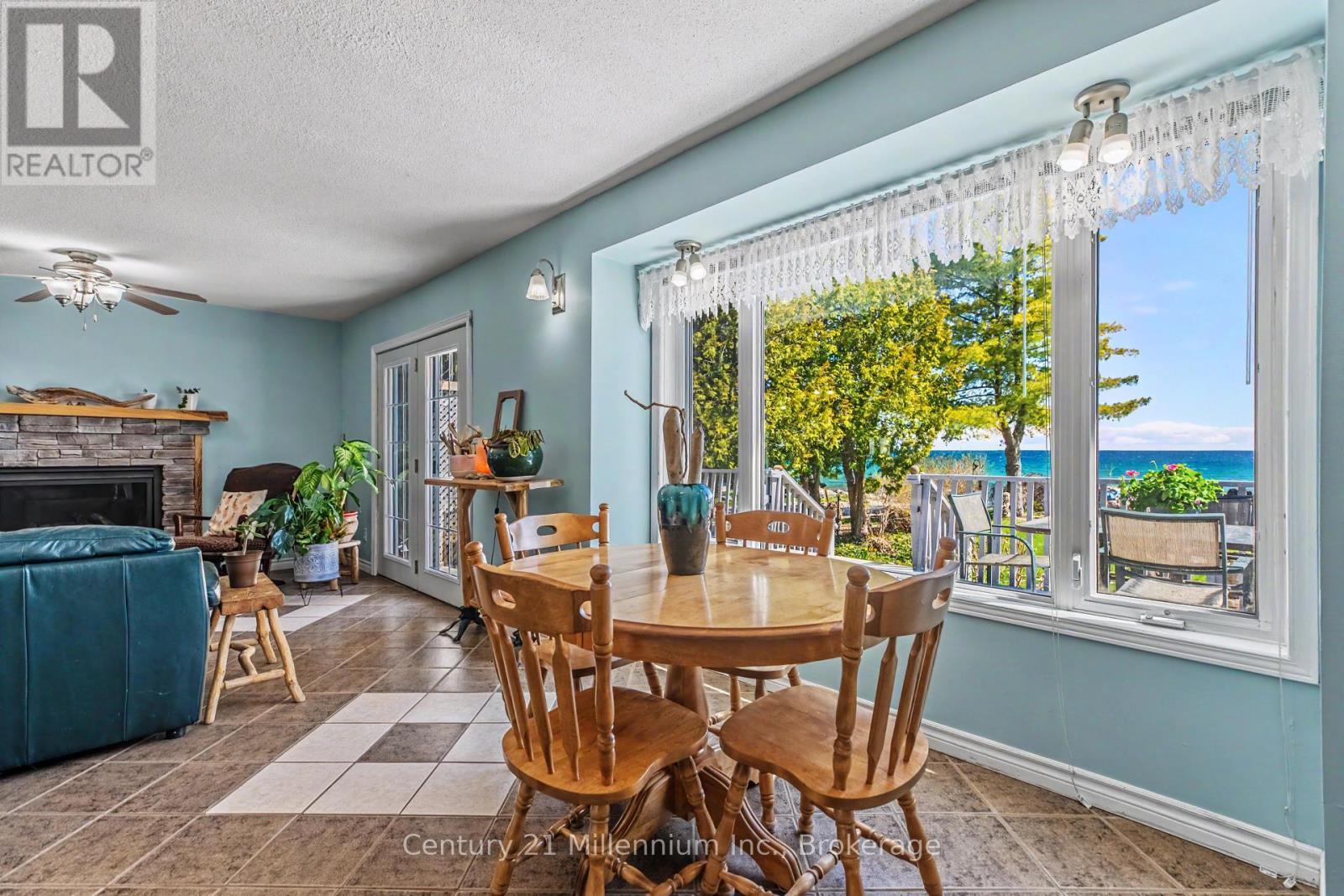 117 Kiowana Beach Road, Meaford, ON - Indoor Photo Showing Dining Room With Fireplace