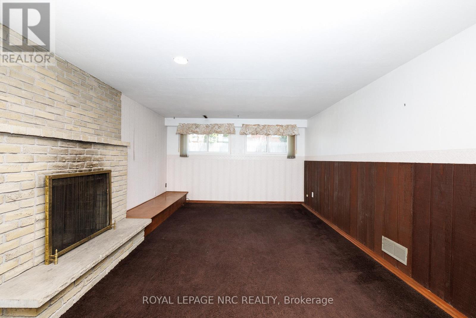 8 Kerwin Gate, St. Catharines (Lakeport), ON - Indoor Photo Showing Other Room With Fireplace