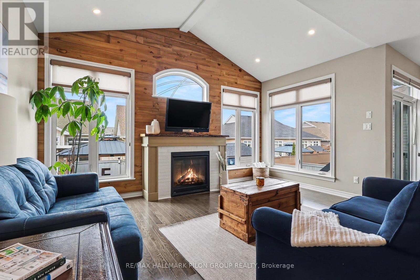 819 Tewin Circle, Ottawa, ON - Indoor Photo Showing Living Room With Fireplace