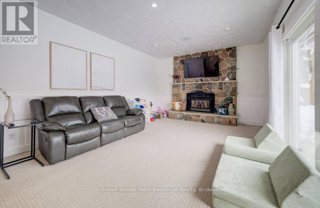 Family room - 33 Tower Road, Arran-Elderslie, ON - Indoor Photo Showing Living Room With Fireplace