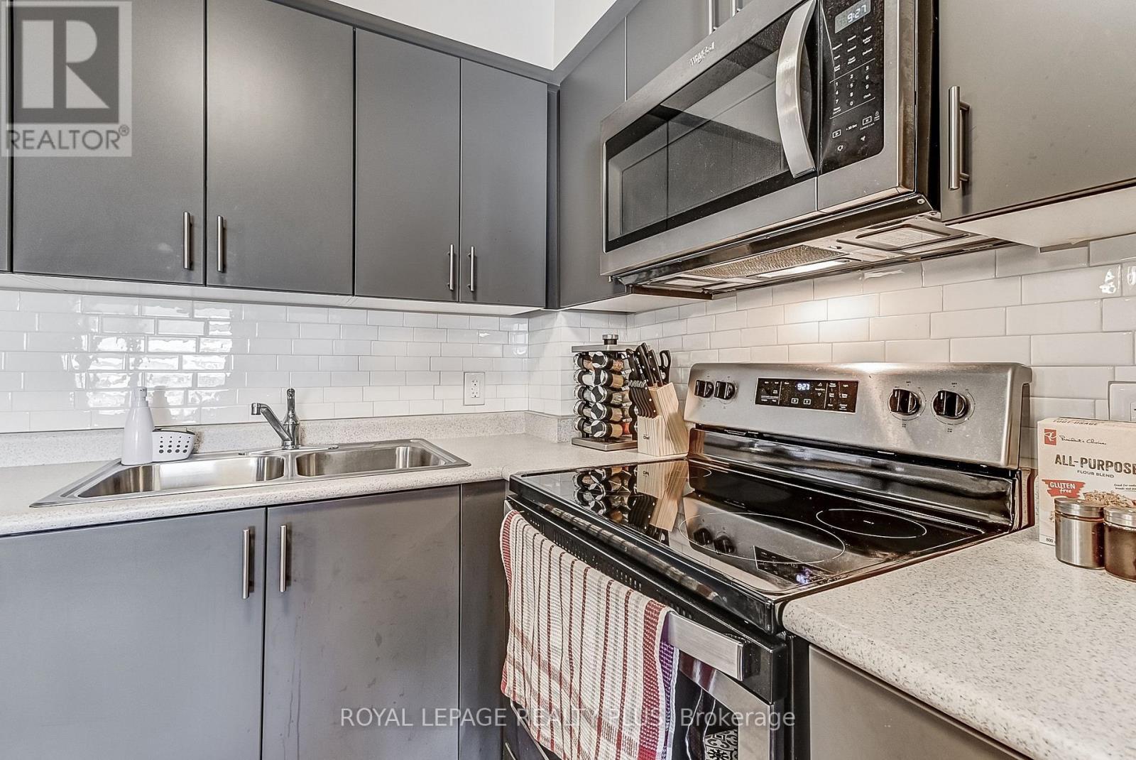 708 - 716 Main Street E, Milton, ON - Indoor Photo Showing Kitchen With Double Sink