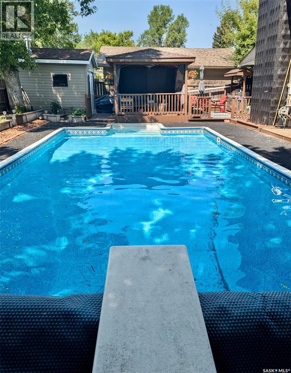 182 Lincoln Drive, Regina, SK - Outdoor With In Ground Pool With Deck Patio Veranda With Backyard