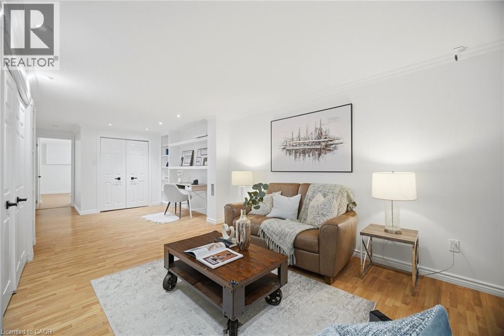 Bright living space featuring light wood-finish flooring and recessed lighting - 1376 Royal Drive, Burlington, ON - Indoor Photo Showing Living Room
