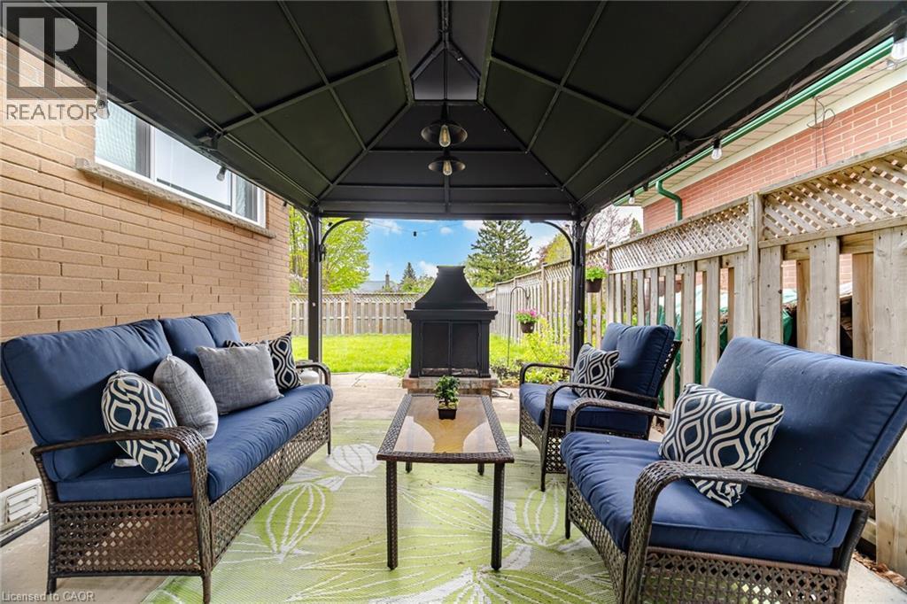 Covered patio space featuring a dark metal gazebo - 1376 Royal Drive, Burlington, ON - Outdoor With Deck Patio Veranda With Exterior