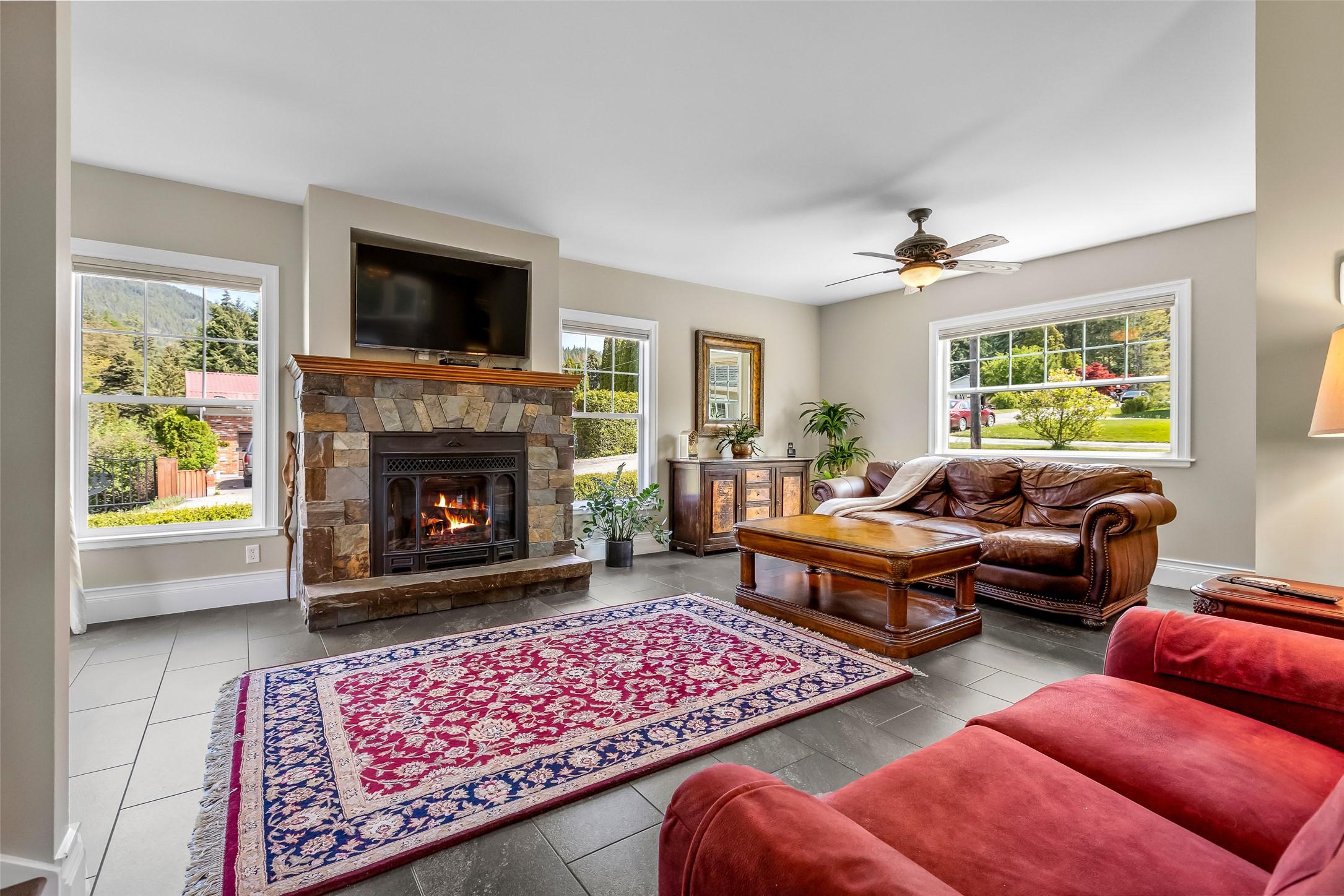 3609 Masuch Road, Creston, BC - Indoor Photo Showing Living Room With Fireplace