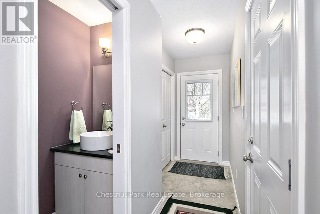 2 piece main floor bathroom - 54 Conservation Way, Collingwood, ON - Indoor Photo Showing Other Room