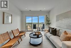 Living area featuring recessed lighting -