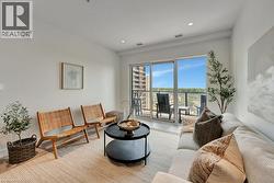 Living room featuring light wood-style floors and recessed lighting -