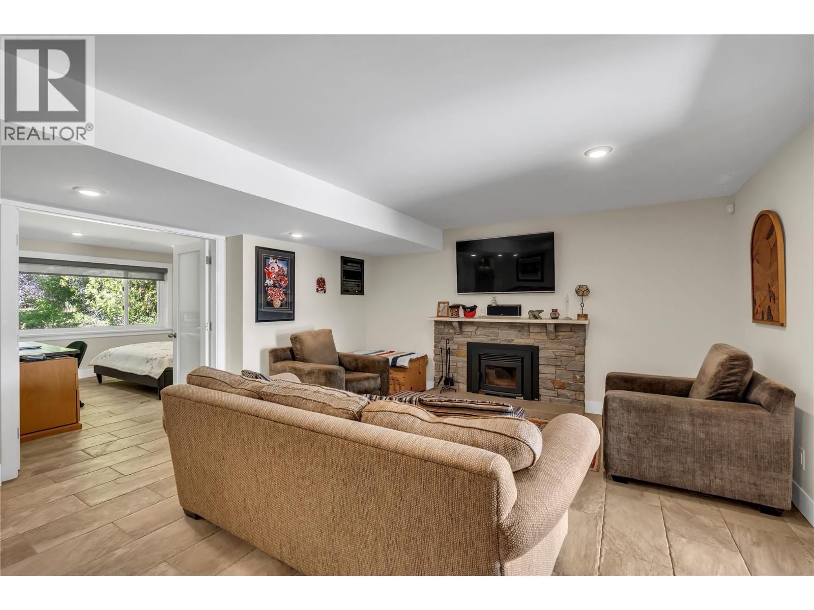 1213 Lambert Drive, Penticton, BC - Indoor Photo Showing Living Room With Fireplace