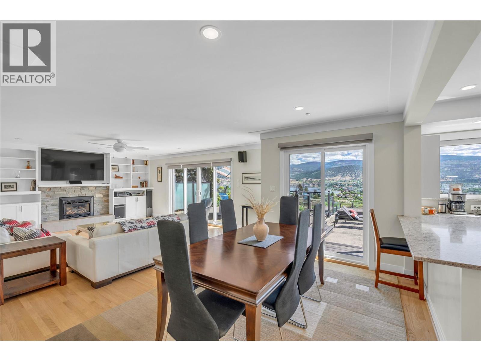 1213 Lambert Drive, Penticton, BC - Indoor Photo Showing Dining Room With Fireplace