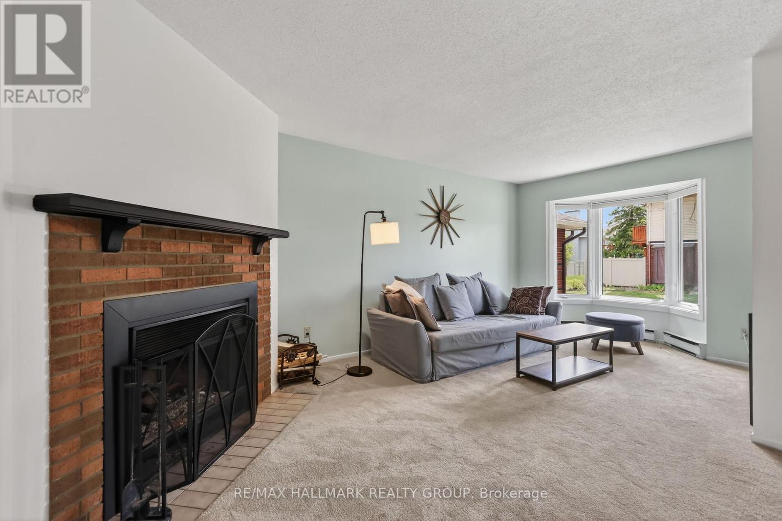 33 Haxby Private, Ottawa, ON - Indoor Photo Showing Living Room With Fireplace