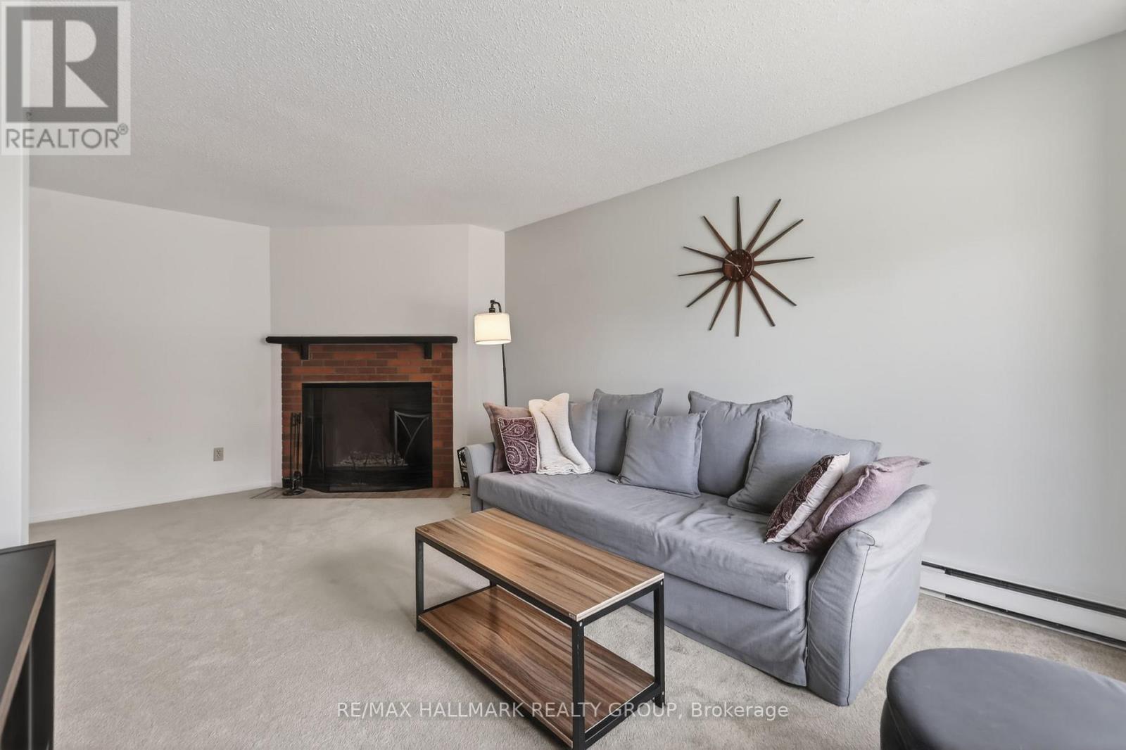 33 Haxby Private, Ottawa, ON - Indoor Photo Showing Living Room With Fireplace