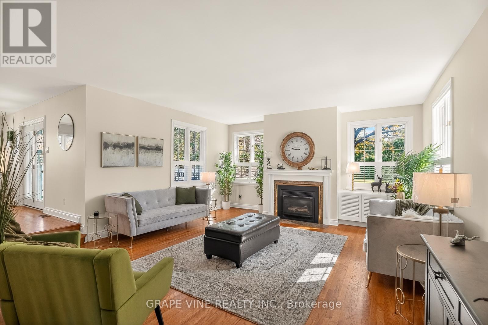 5763 Gowan Gate, Ottawa, ON - Indoor Photo Showing Living Room With Fireplace