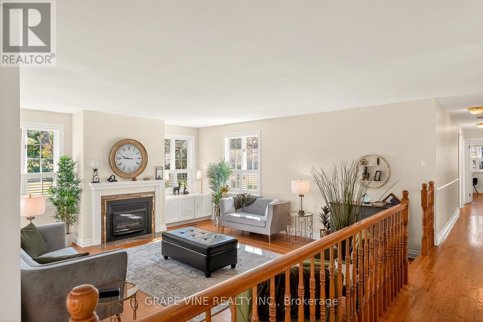 5763 Gowan Gate, Ottawa, ON - Indoor Photo Showing Living Room With Fireplace