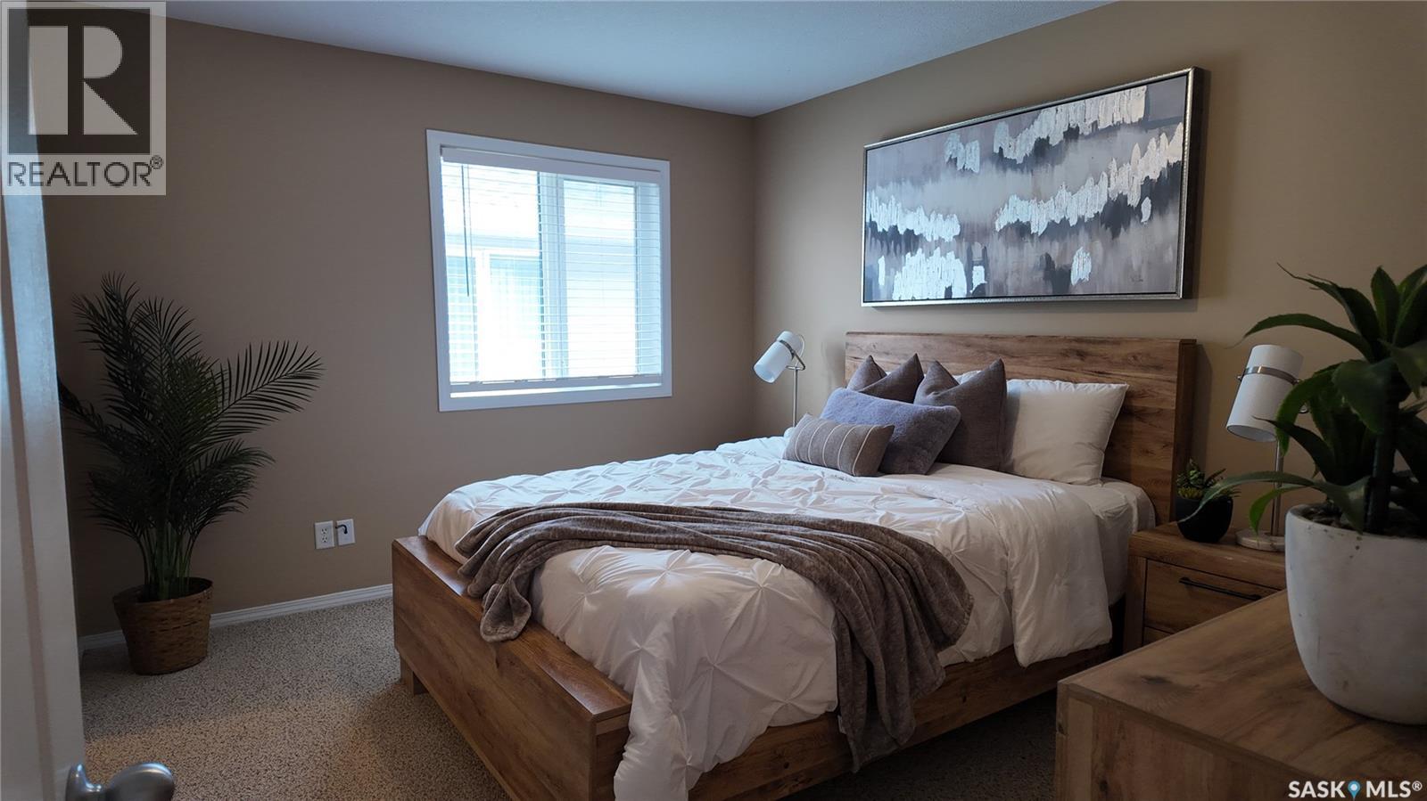 E 4128 Buckingham Drive, Regina, SK - Indoor Photo Showing Bedroom