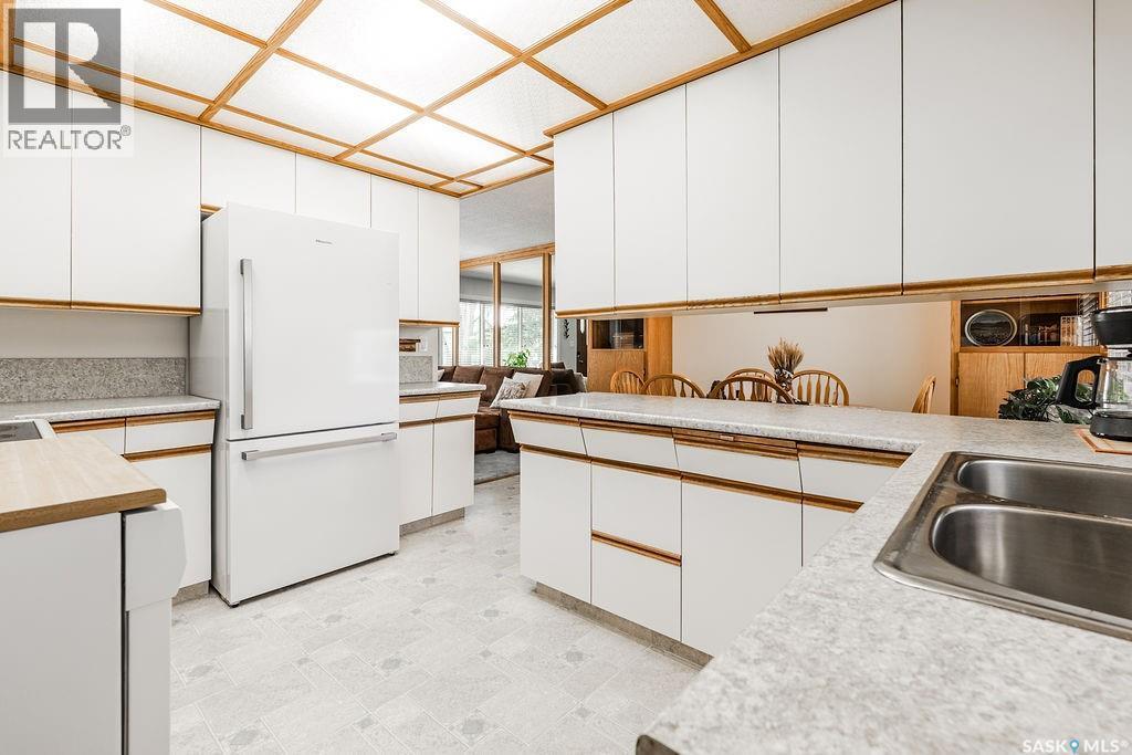 211 2Nd Street E, Langham, SK - Indoor Photo Showing Kitchen With Double Sink