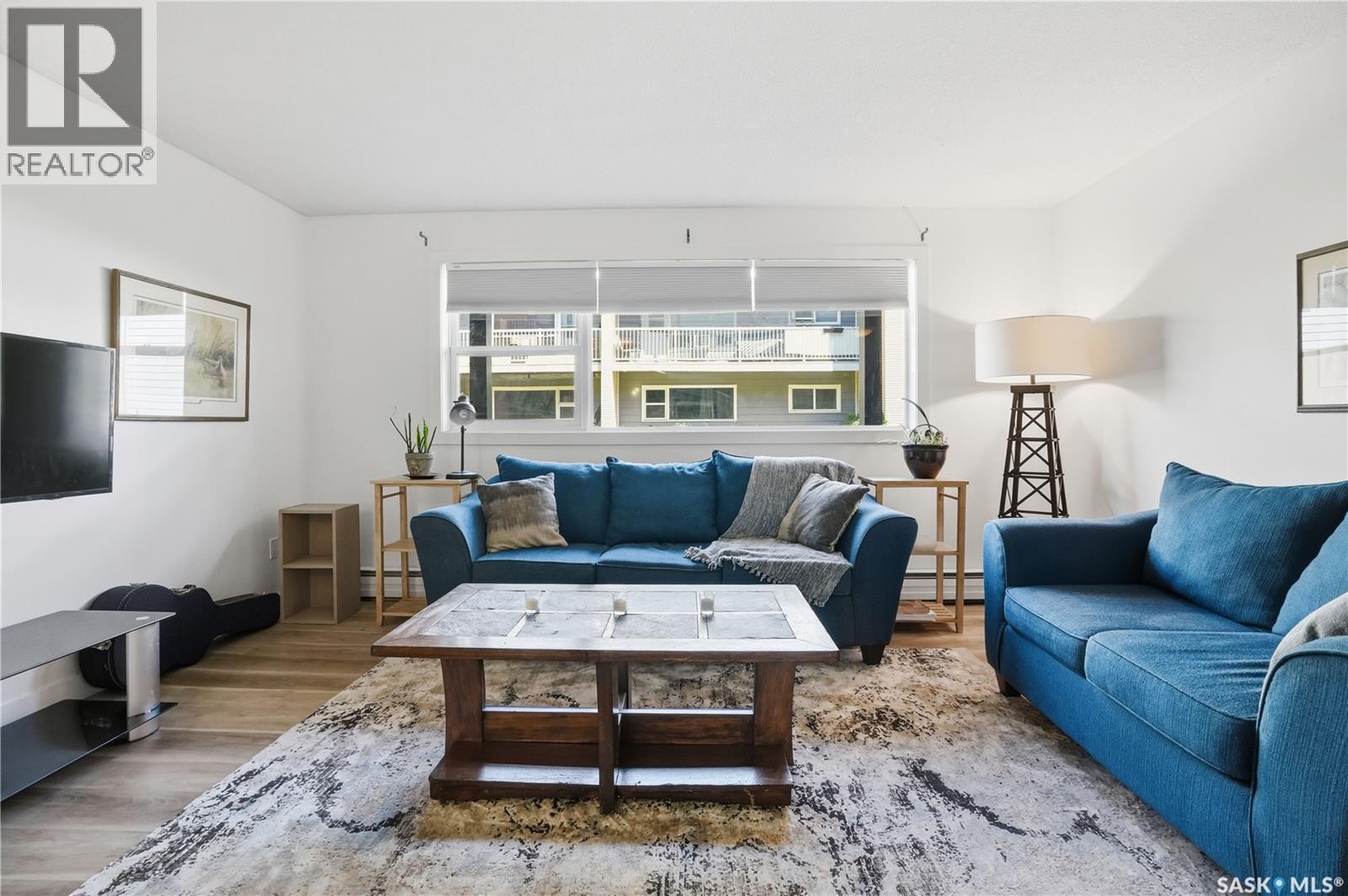 28 42 Spence Street, Regina, SK - Indoor Photo Showing Living Room