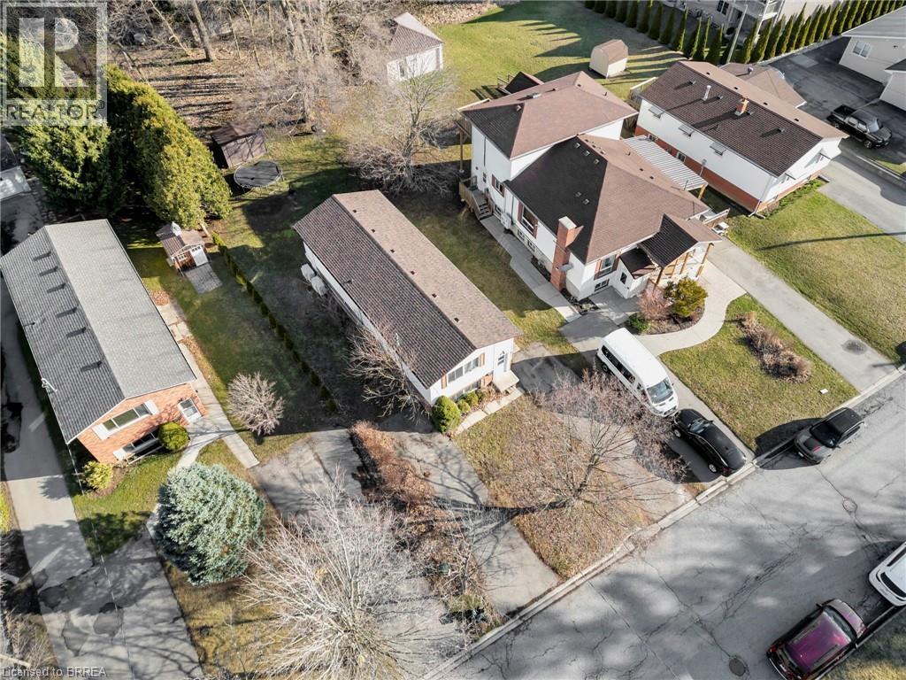 Aerial perspective highlighting multiple residential structures - 9 Cherry Street, Simcoe, ON - Outdoor