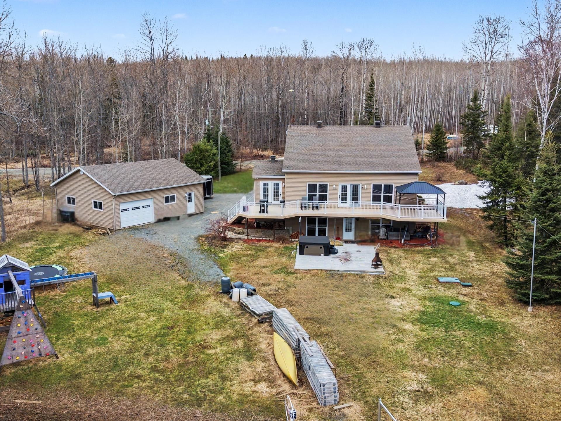 Back of Structure - 1038 Ch. Bergeron, Rouyn-Noranda, QC - Outdoor With Deck Patio Veranda