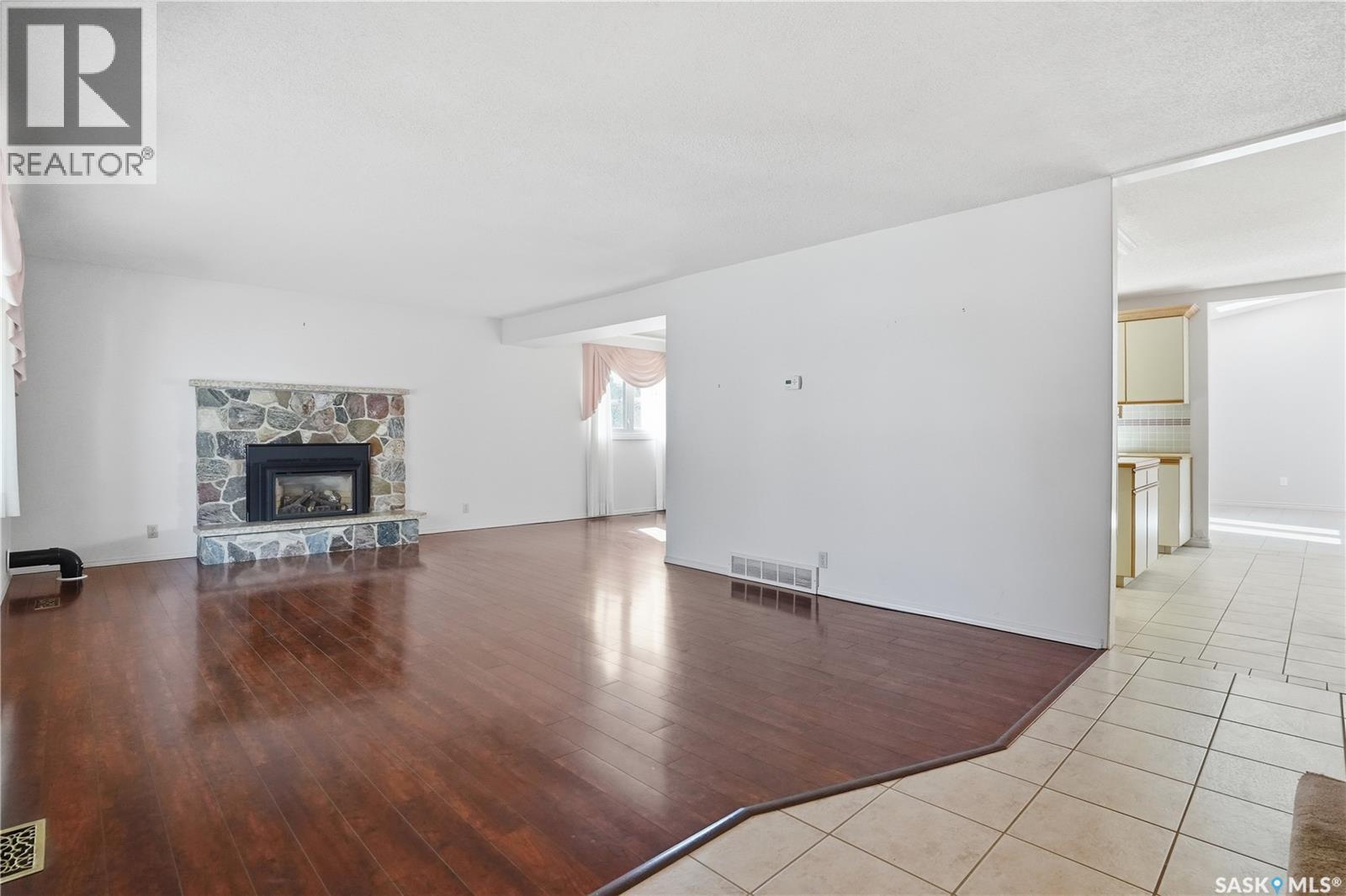 2 Culliton Crescent, Regina, SK - Indoor Photo Showing Living Room With Fireplace