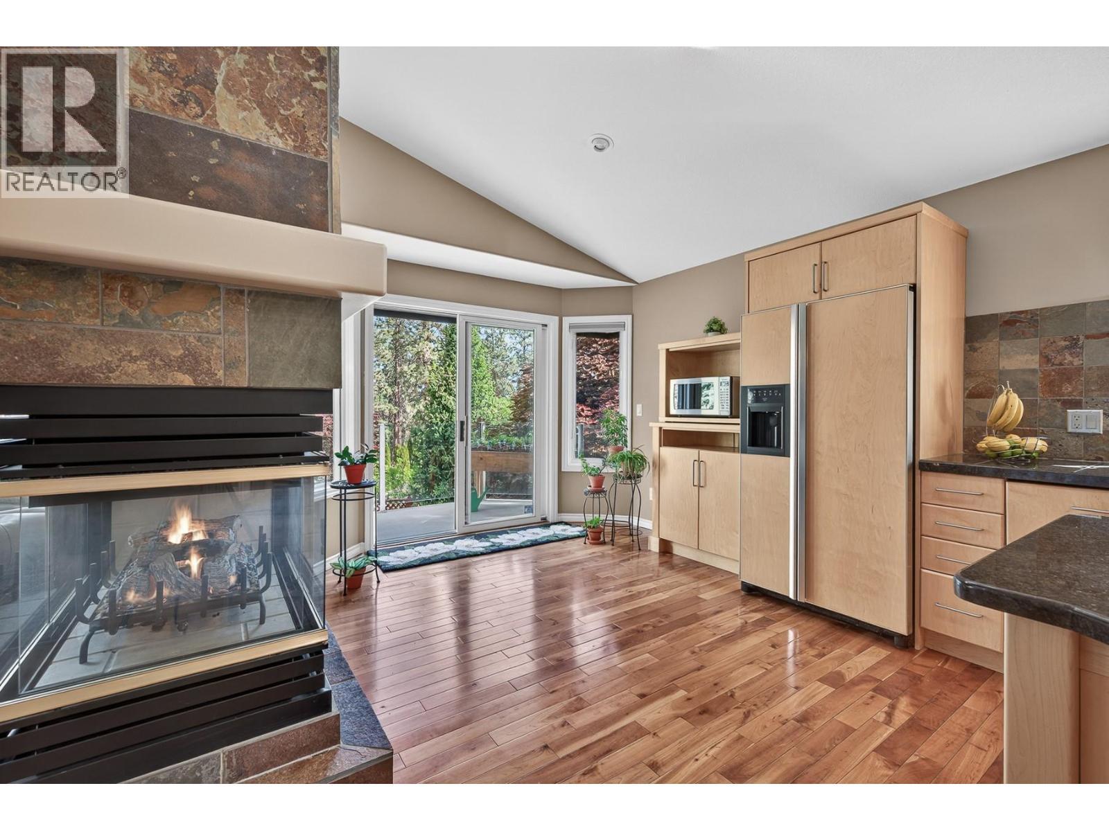 3929 Gallaghers Circle, Kelowna, BC - Indoor With Fireplace